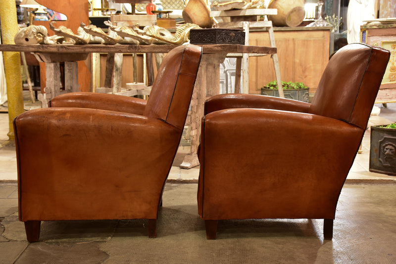 Pair of vintage French leather club chairs with square backs