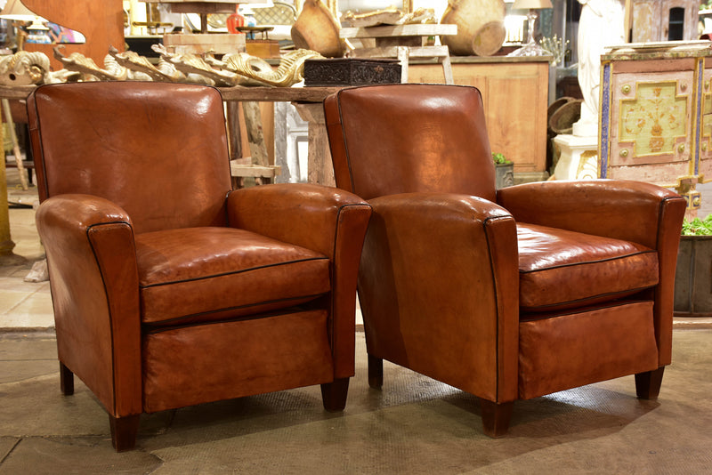 Pair of vintage French leather club chairs with square backs