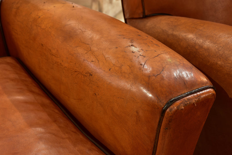 Pair of vintage French leather club chairs with square backs
