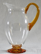 Set of eight tumblers with matching pitcher - clear and amber glass