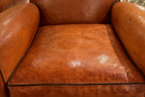 Pair of vintage French leather club chairs with square backs
