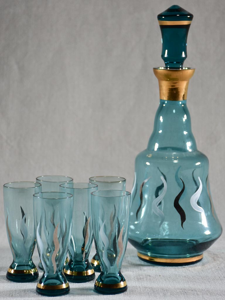 Set of six blue liqueur glasses with matching carafe