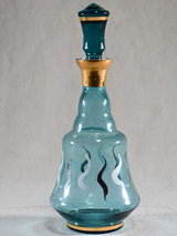 Set of six blue liqueur glasses with matching carafe