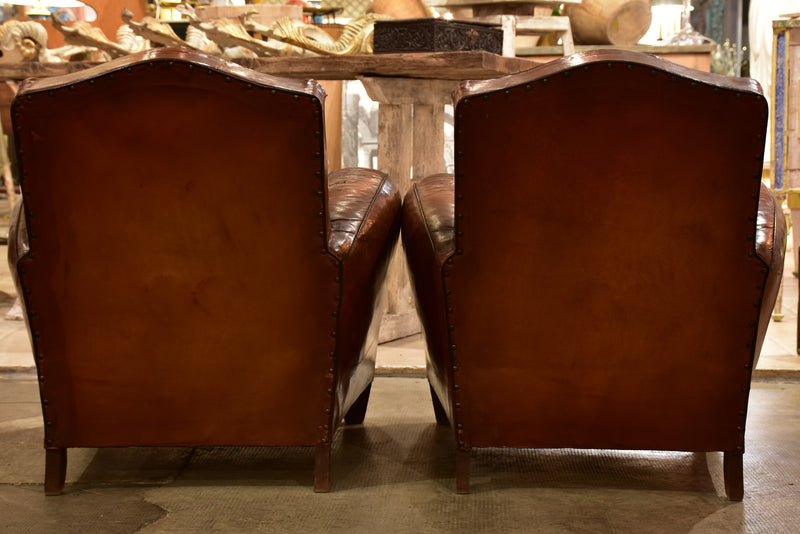 Pair of vintage French leather club chairs with - chapeau gendarme