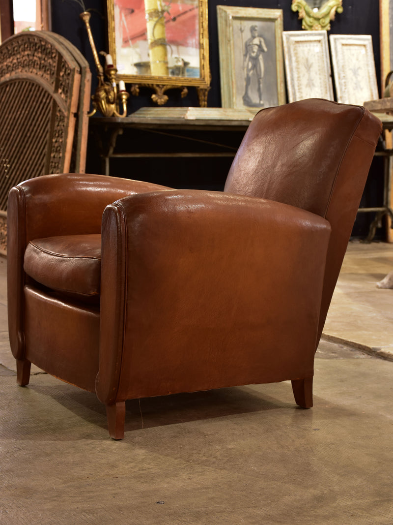 French leather club chair with chapeau gendarme back
