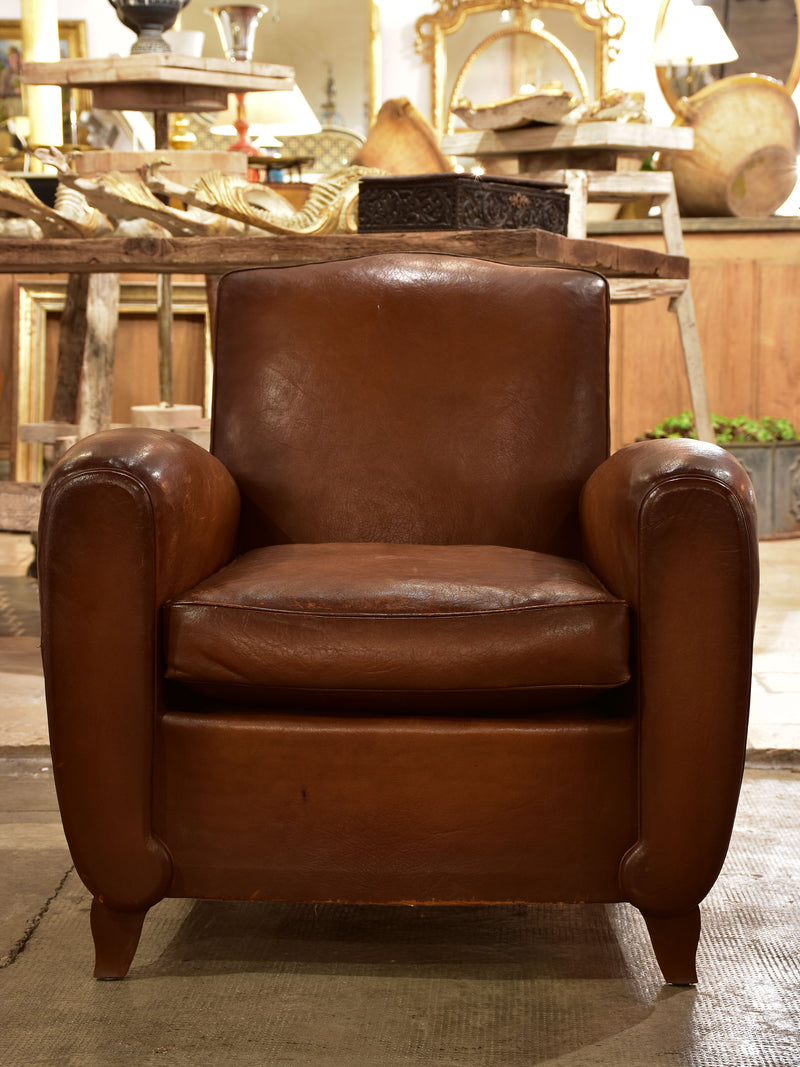 French leather club chair with chapeau gendarme back