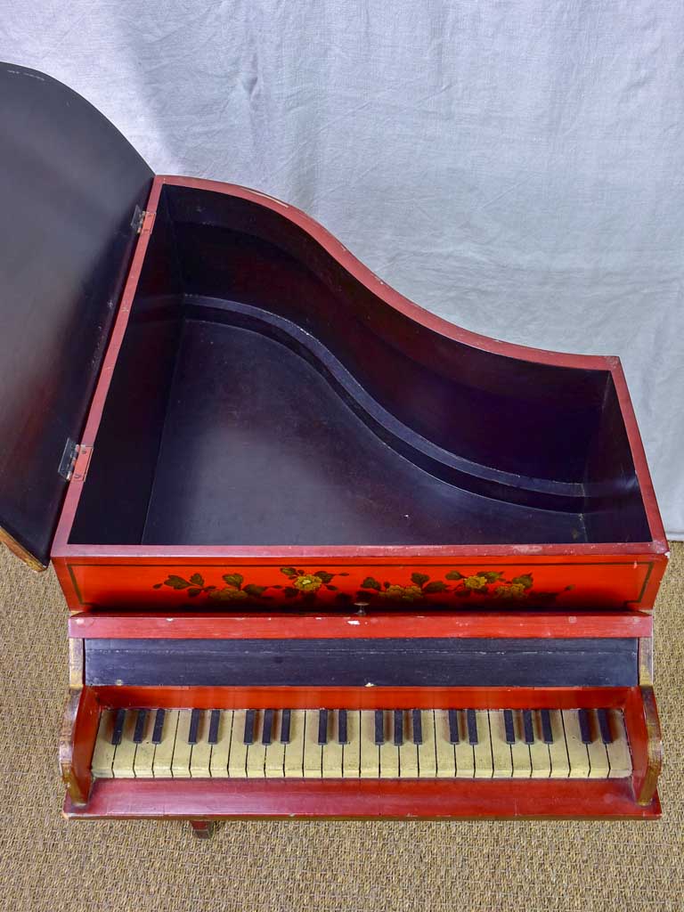 Antique small scale grand piano