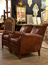 Pair of French leather club chairs from the 1930's with stud detail