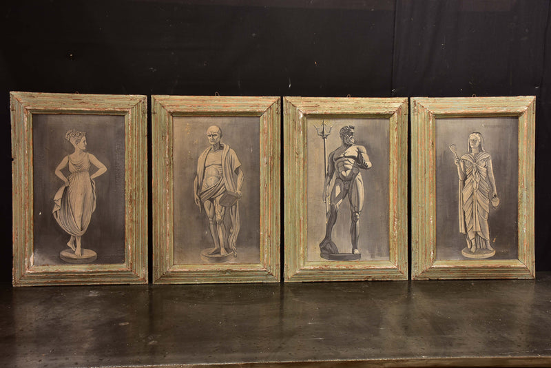 Four framed artworks - statues