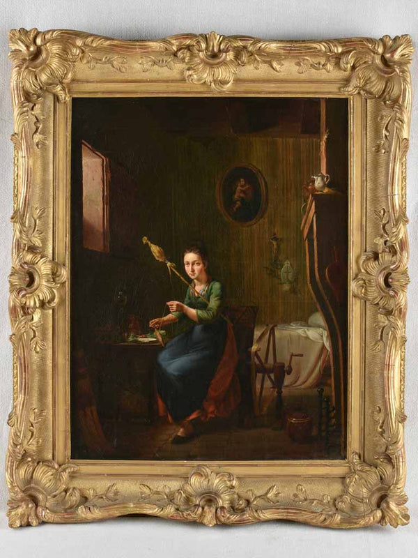 Antique oil painting of lady spinning