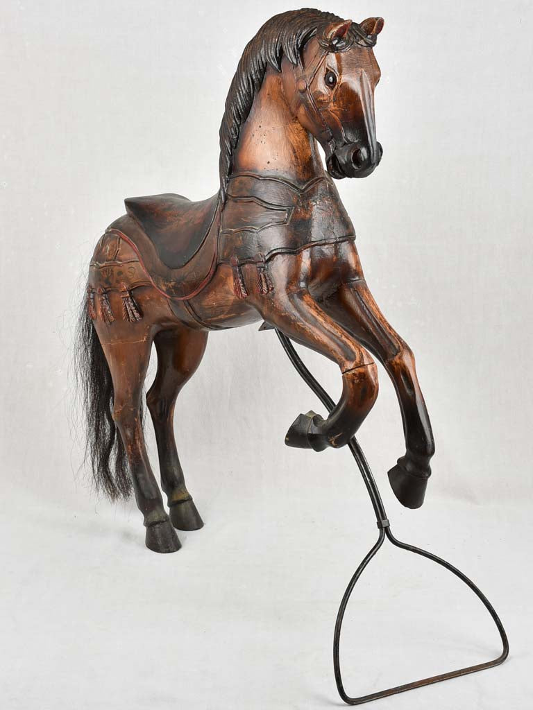 Aged wooden carousel horse with wax finish