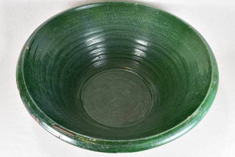 Very large antique French tian bowl with dark green glaze 28"