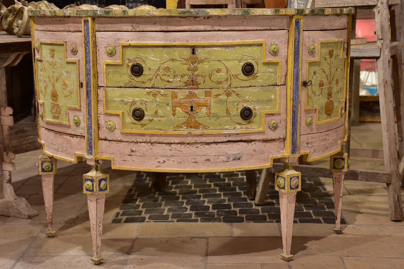 Demilune commode with pink, green, yellow and blue patina