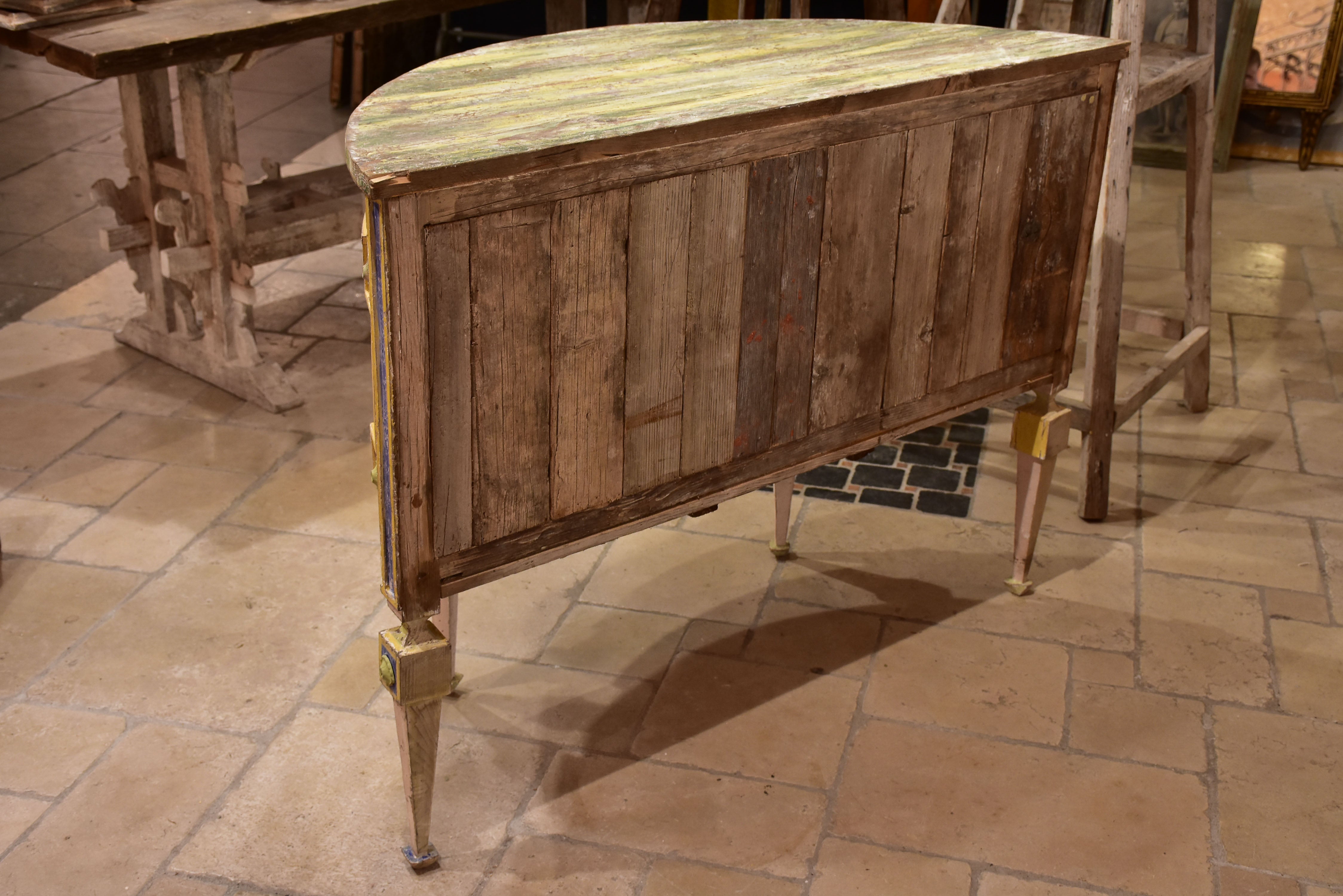 Demilune commode with pink, green, yellow and blue patina