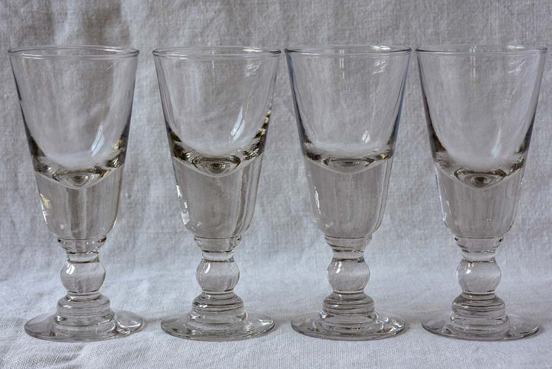 Four late 19th Century French absinthe glasses