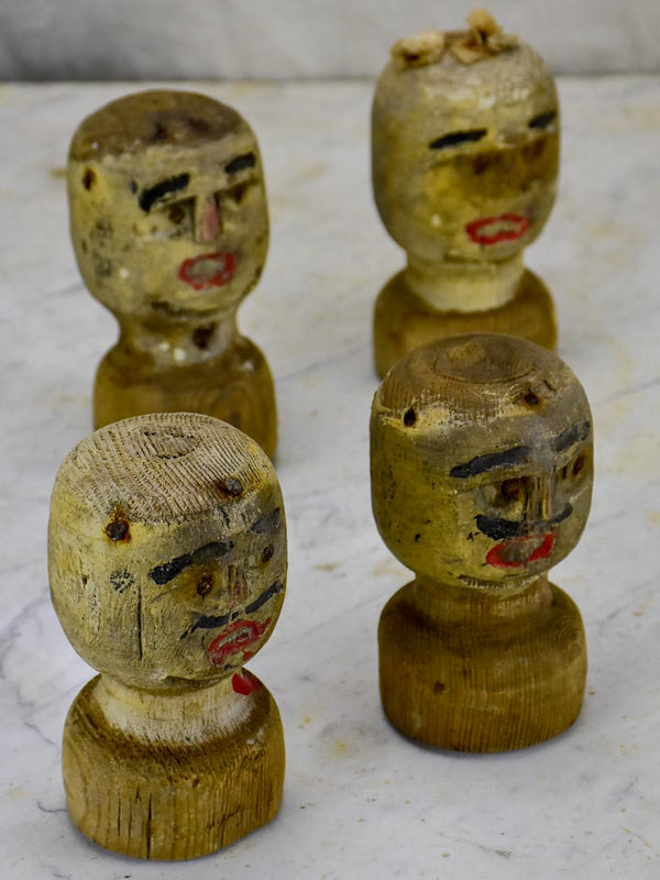 Antique French game carved wooden heads