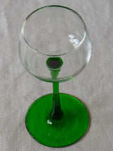 Six vintage Alsatian wine glasses with green stems