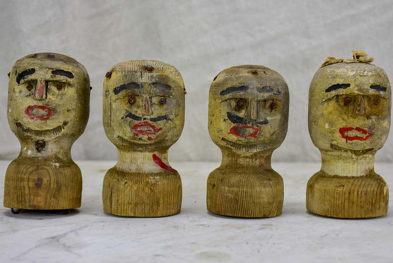 Early 20th-century carnival game heads
