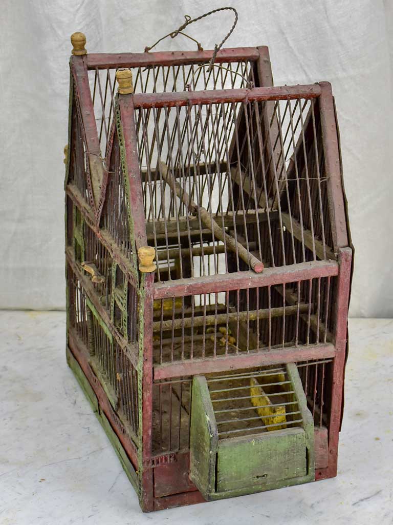 Antique French birdcage with double-pitched roof