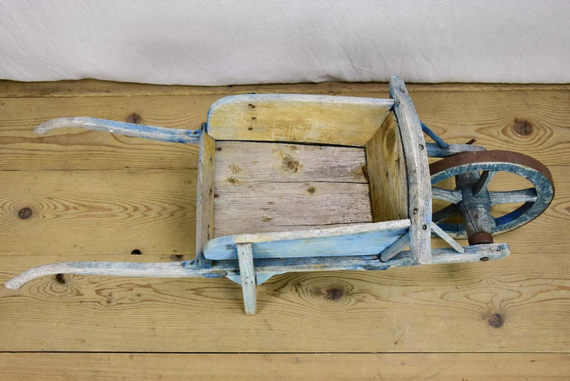 Early 20th Century French children's wheelbarrow with blue patina