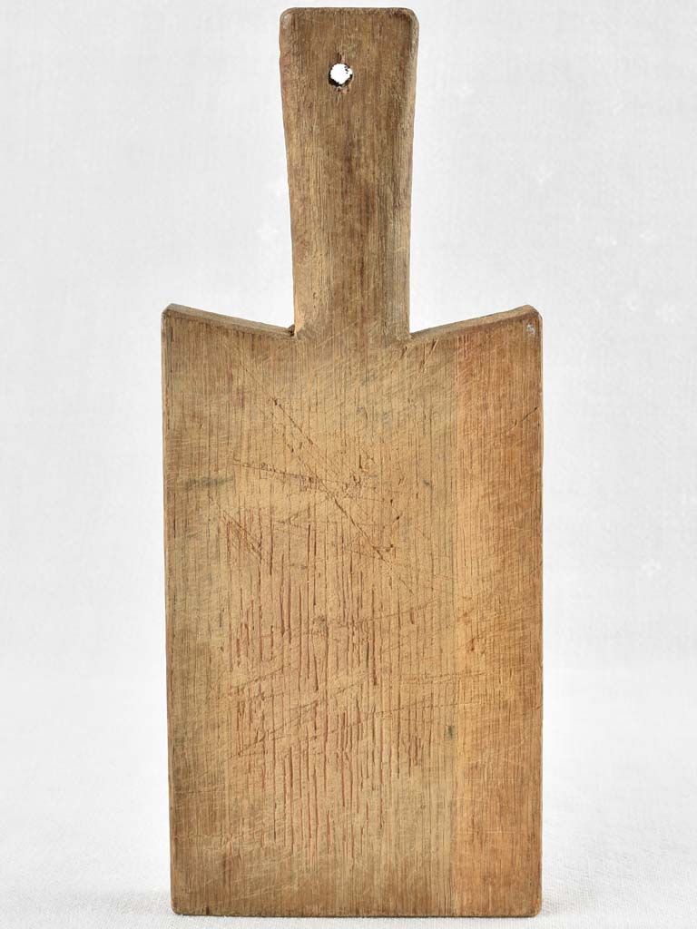 Antique French cutting board with peaked shoulders - 13" x 5½"