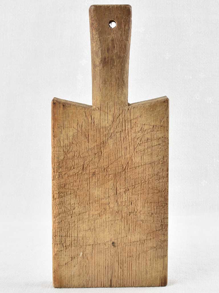 Antique French cutting board with peaked shoulders - 13" x 5½"