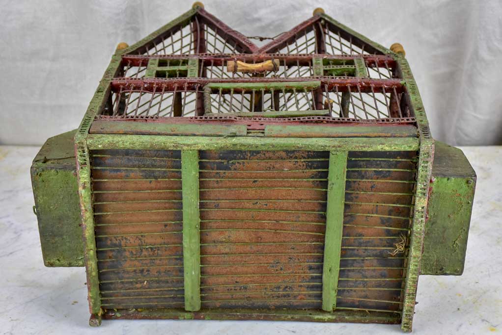 Antique French birdcage with double-pitched roof
