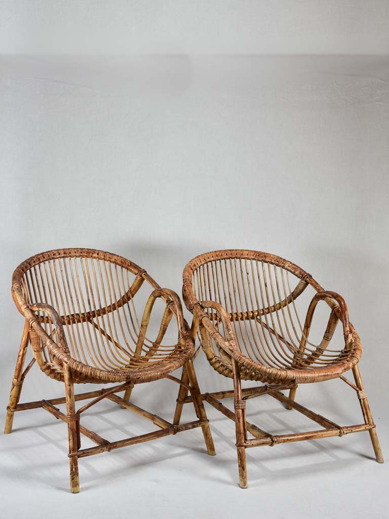 Pair of low rattan armchairs for a winter garden