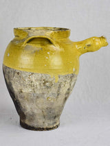 Early 19th Century French cooking clay pot with yellow glaze and handle