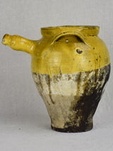 Early 19th Century French cooking clay pot with yellow glaze and handle