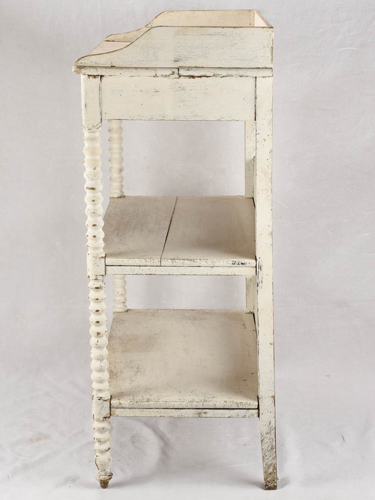 Late 19th century shelving unit with white patina