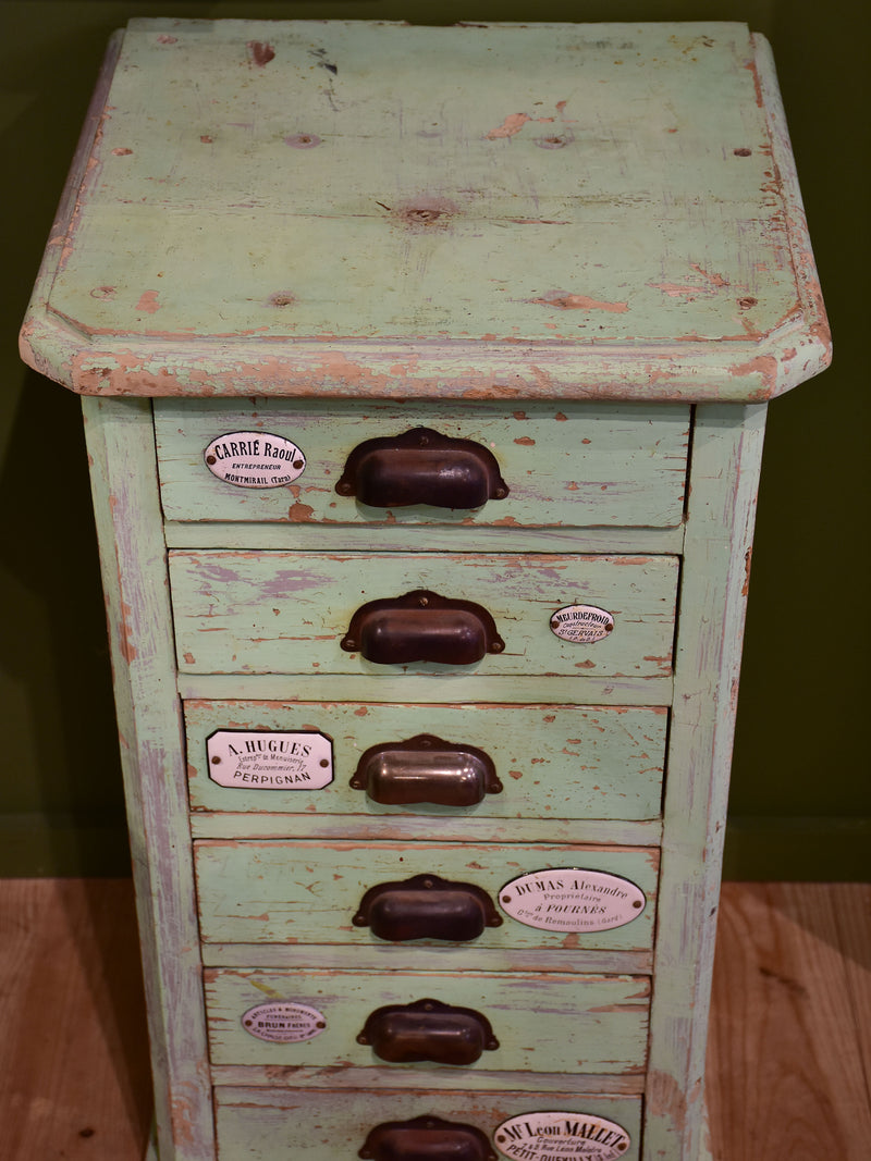 Set of small merchant's drawers with green patina
