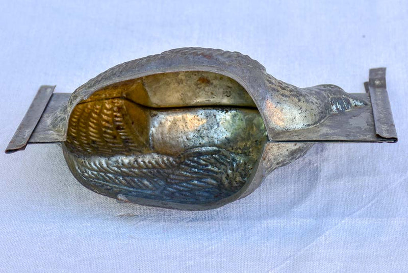 Antique French tin plate chocolate mold in the shape of a chicken