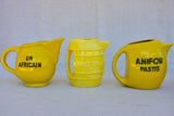 Collection of eight 1930's Pastis water pitchers