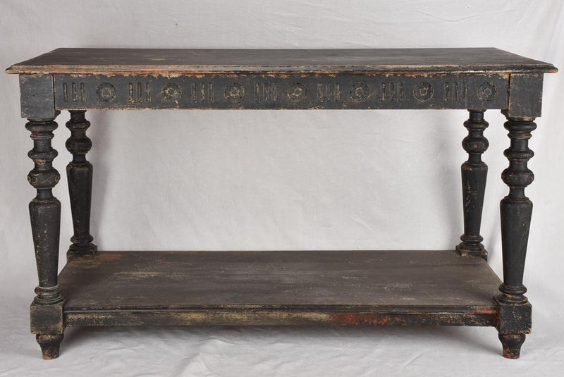 Late 19th century draper table with black patina