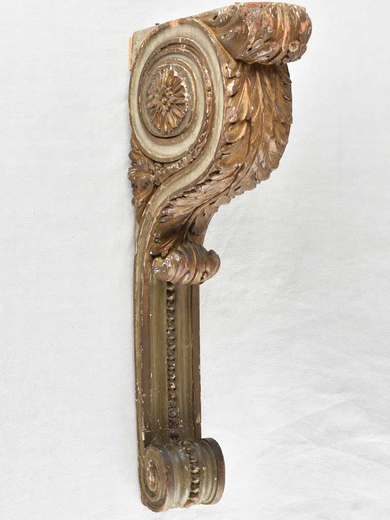 Timeworn painted and gilt finish brackets