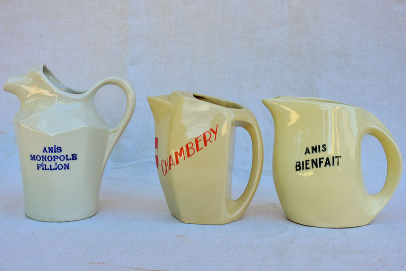 Collection of eight 1930's Pastis water pitchers