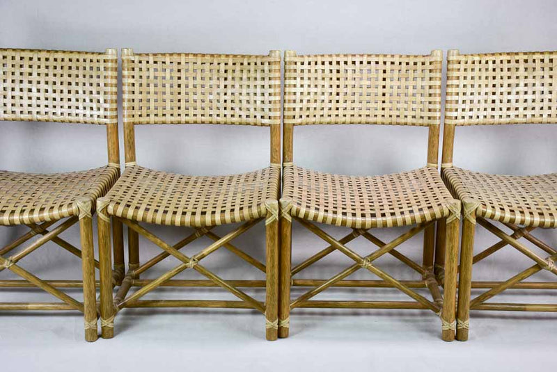 Four woven leather chairs from the 1960's John McGuire