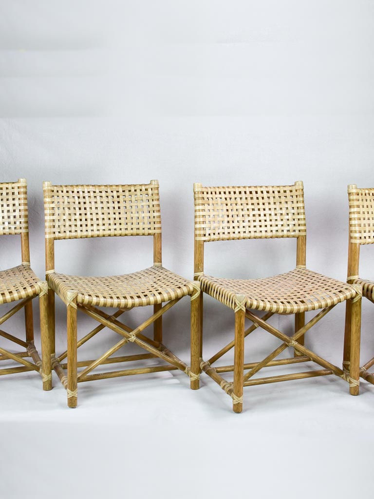 Four woven leather chairs from the 1960's John McGuire