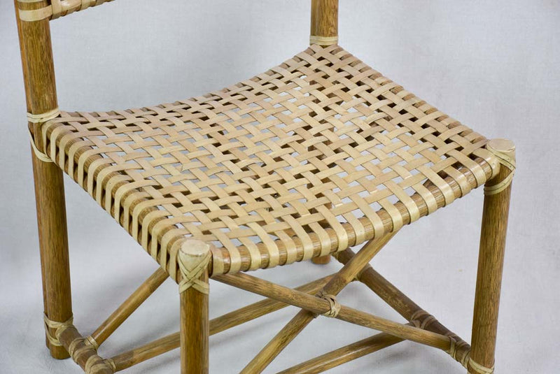 Four woven leather chairs from the 1960's John McGuire