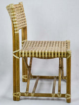 Four woven leather chairs from the 1960's John McGuire