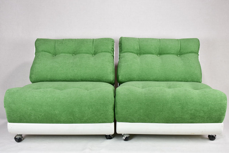 Pair of large vintage lounge chairs with green upholstery