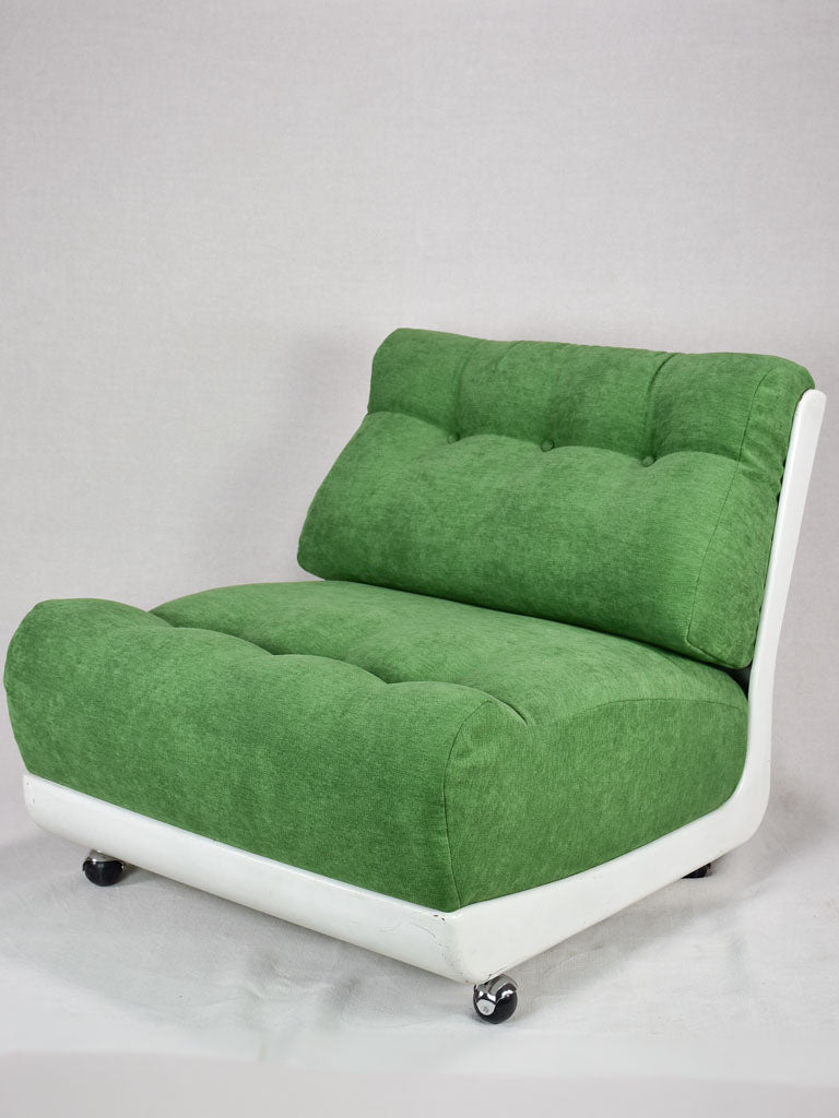 Pair of large vintage lounge chairs with green upholstery