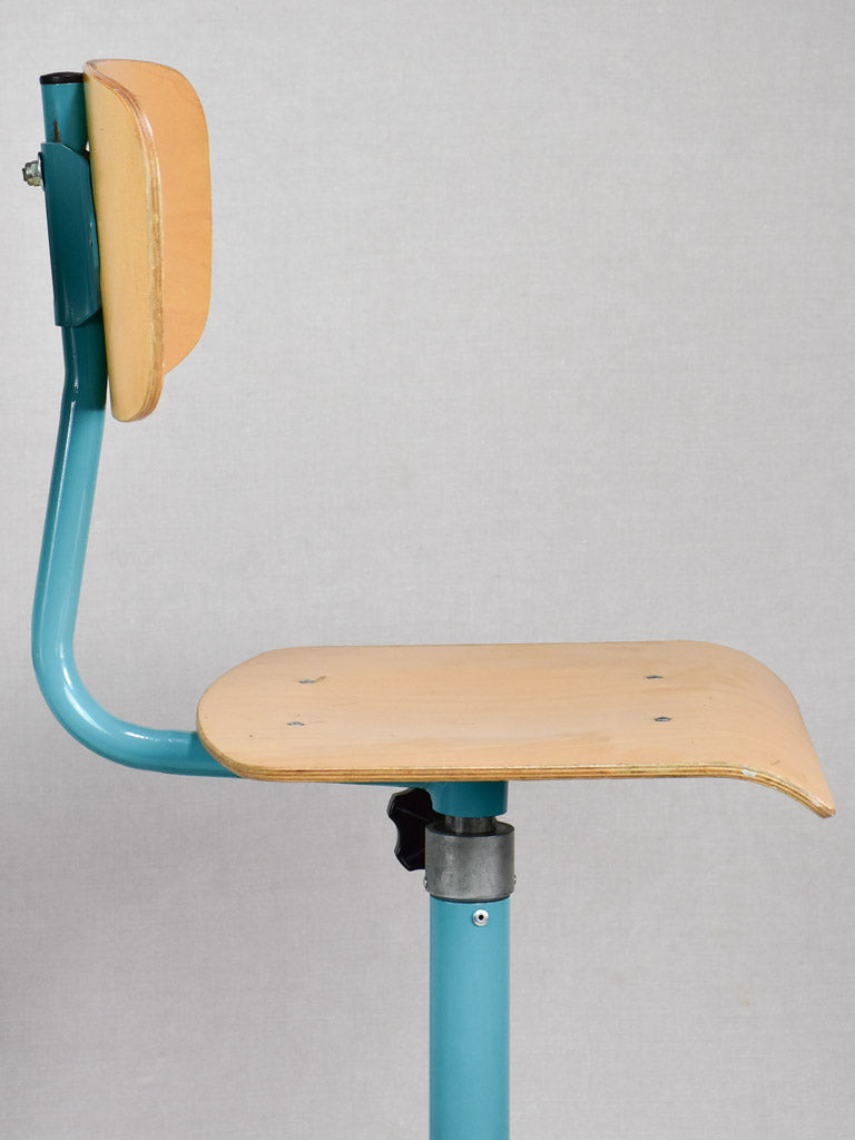 Pair of blue adjustable stools from a Swiss art college