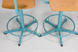 Pair of blue adjustable stools from a Swiss art college