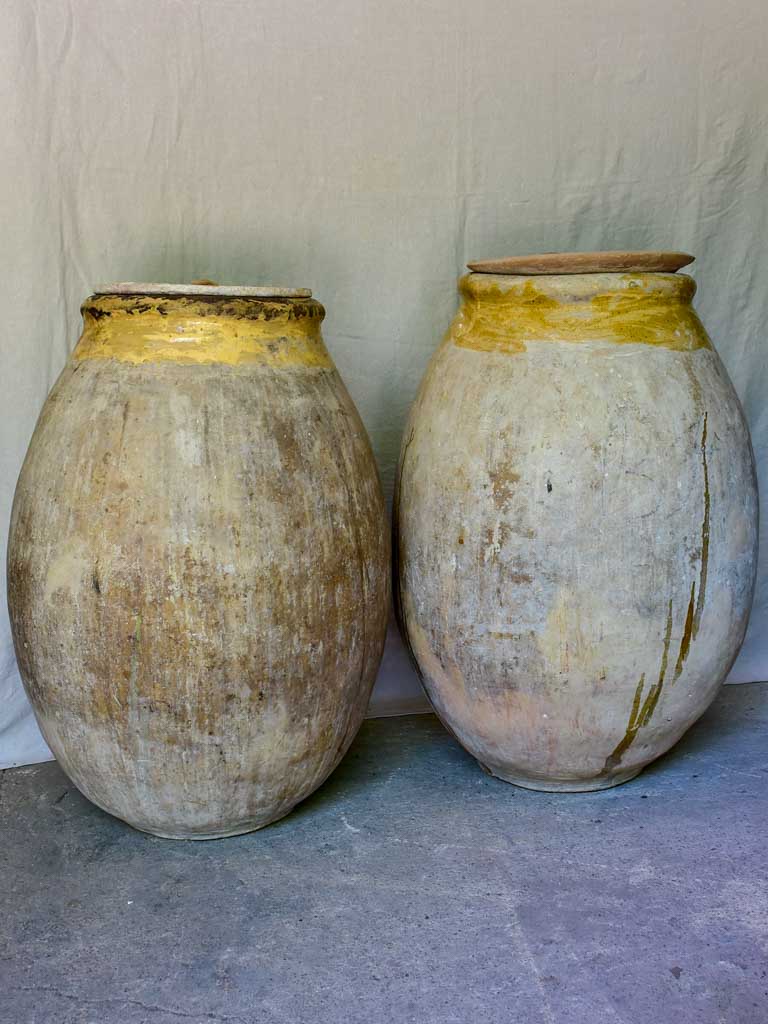 Two very large 18th Century Biot Jars with terracotta lids 41"
