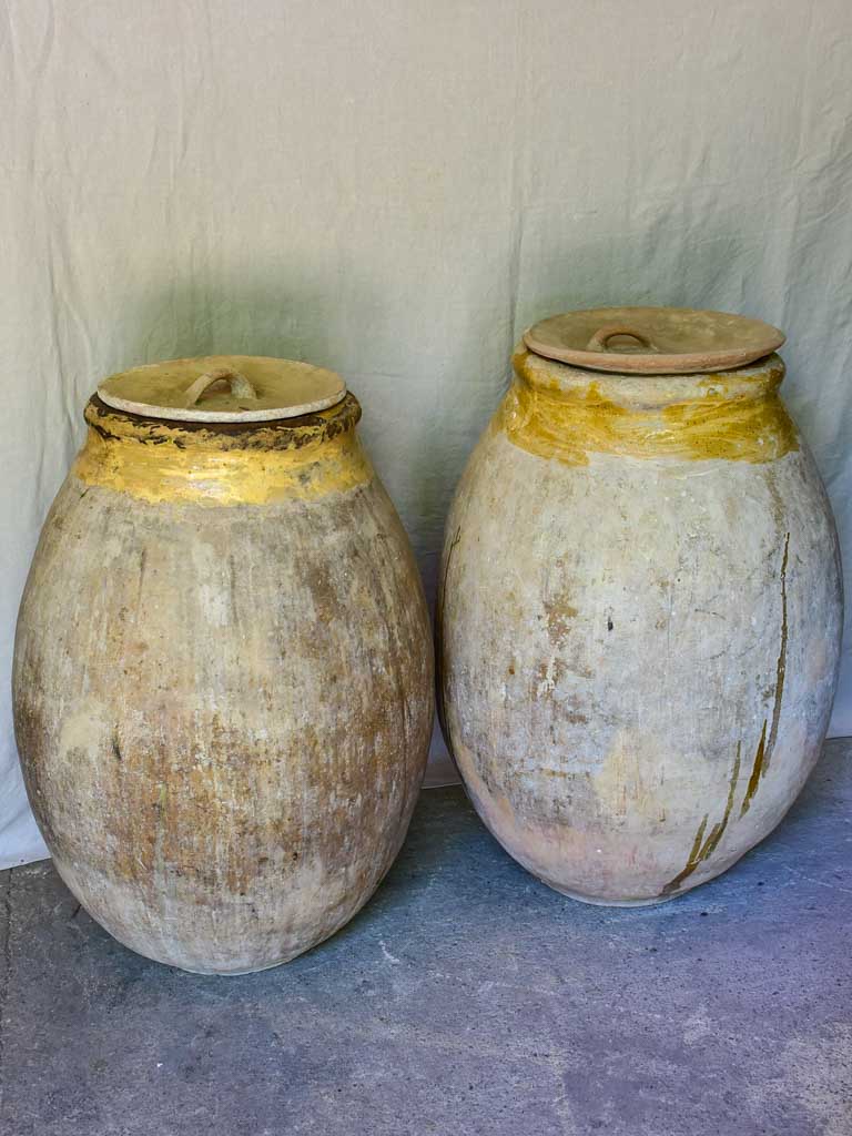Two very large 18th Century Biot Jars with terracotta lids 41"