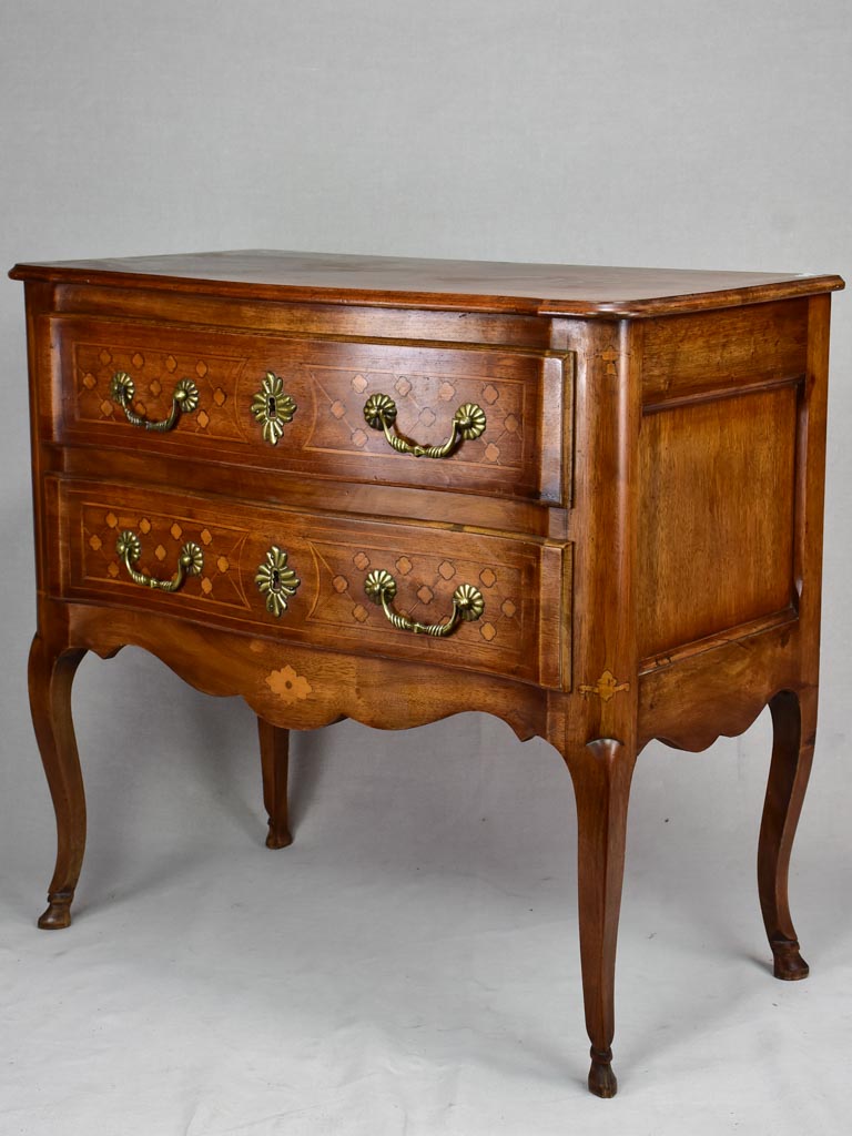 Antique French marquetry sauteuse commode with hoof feet