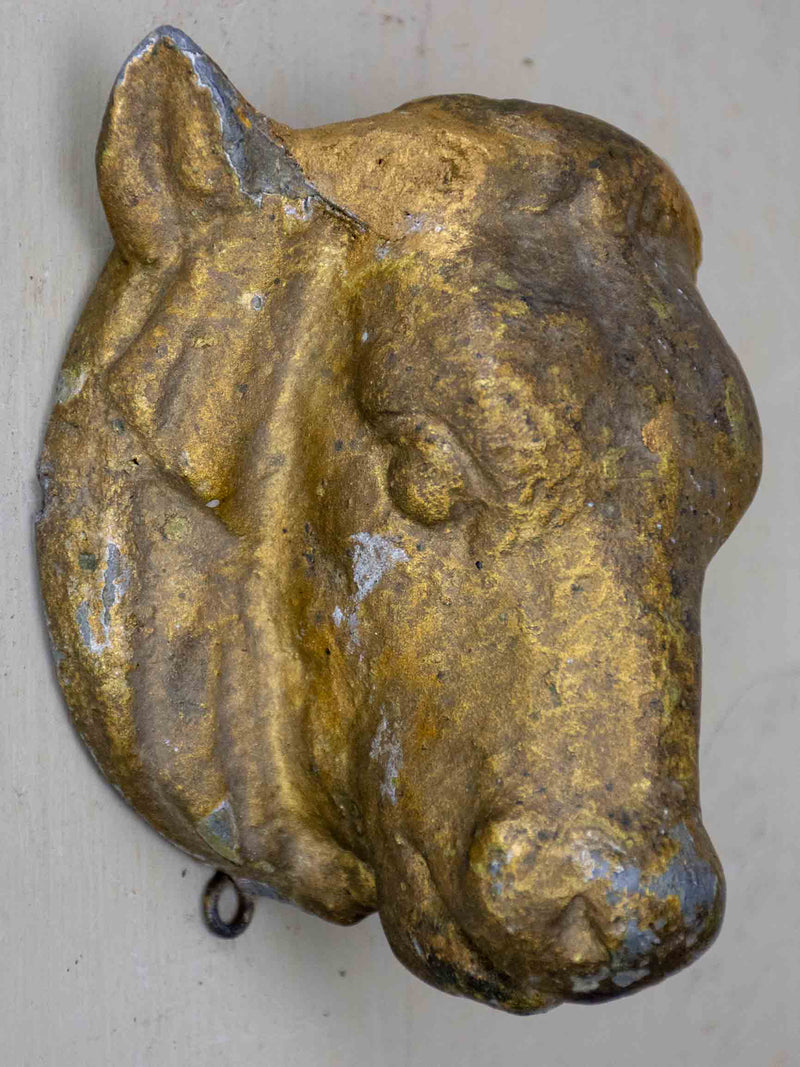 Antique cast iron cow's head from a butcher's table