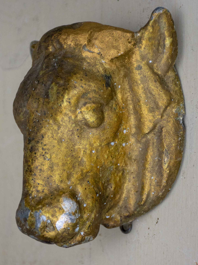 Antique cast iron cow's head from a butcher's table